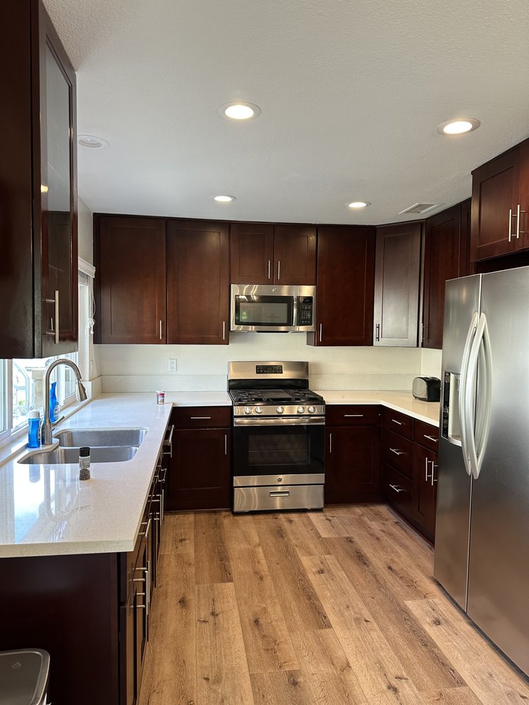 Kitchen before: dark cherry shaker cabinets
