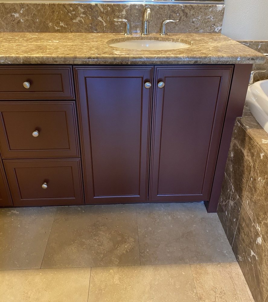The same vanity after: smooth dark red finish