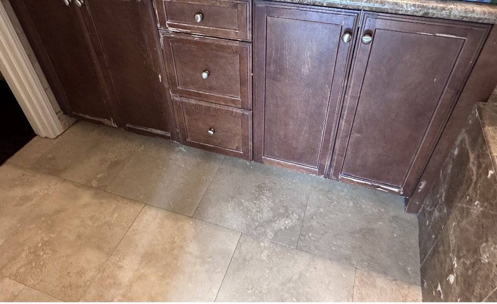 Bathroom vanity before: worn, chipped brown finish